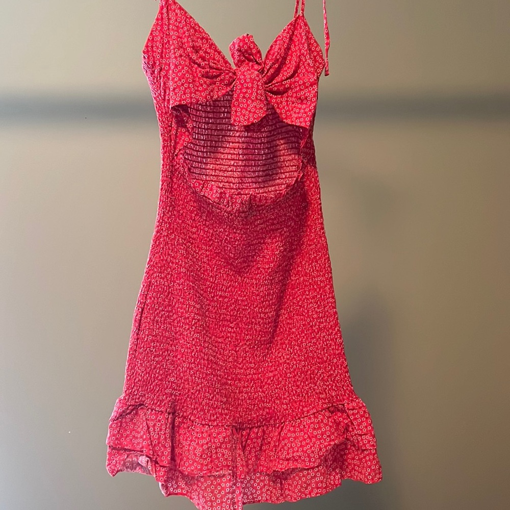 Red dress with bow and cutout